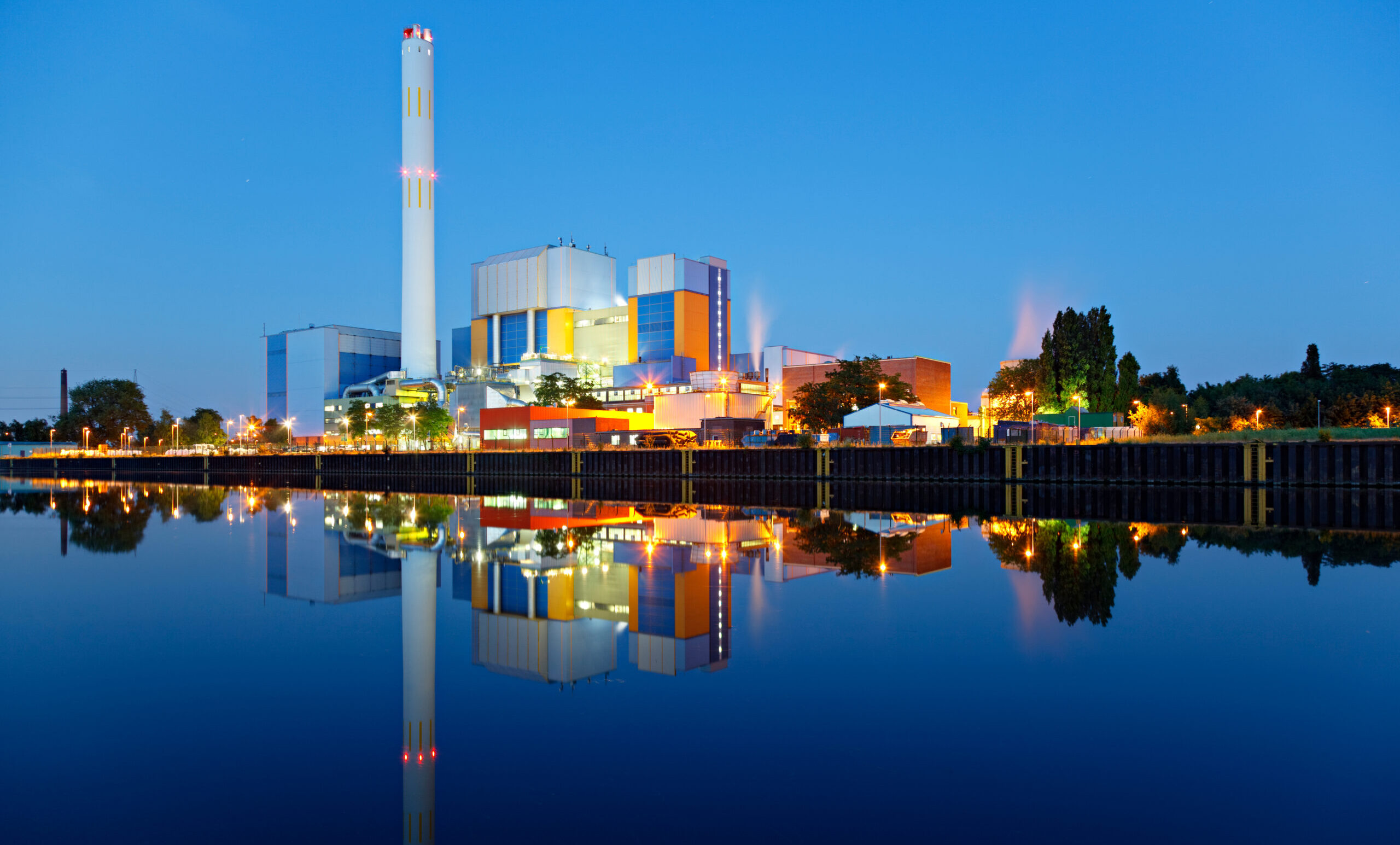 An,Incineration,Plant,At,A,Canal,At,Blue,Hour,In