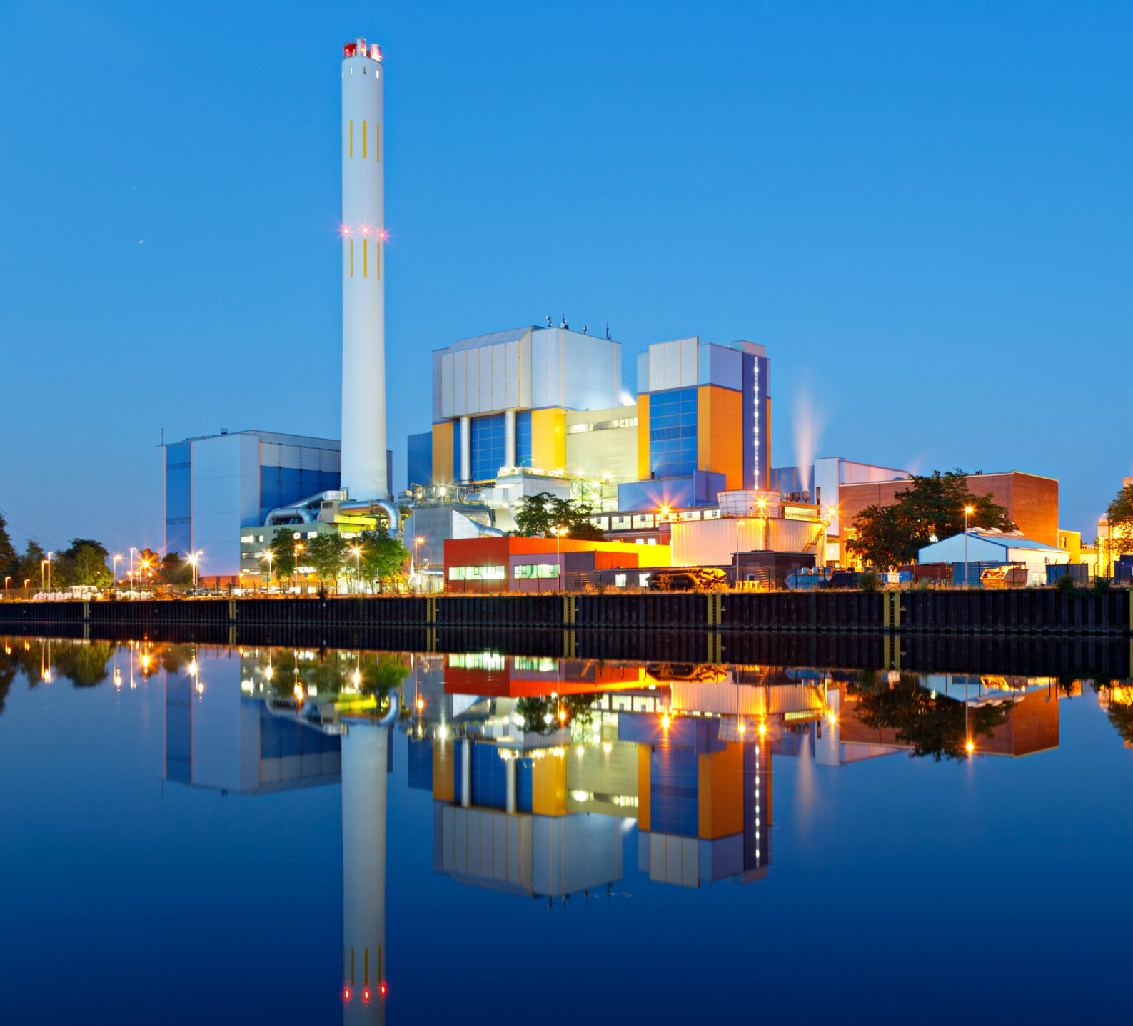 An,Incineration,Plant,At,A,Canal,At,Blue,Hour,In